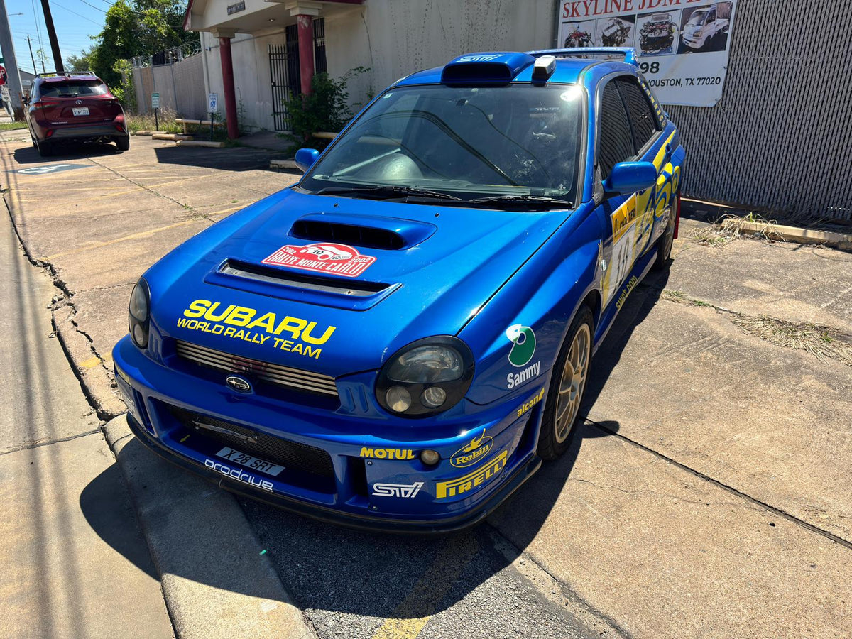 Right-hand-drive JDM Subaru WRX STI imported from Japan