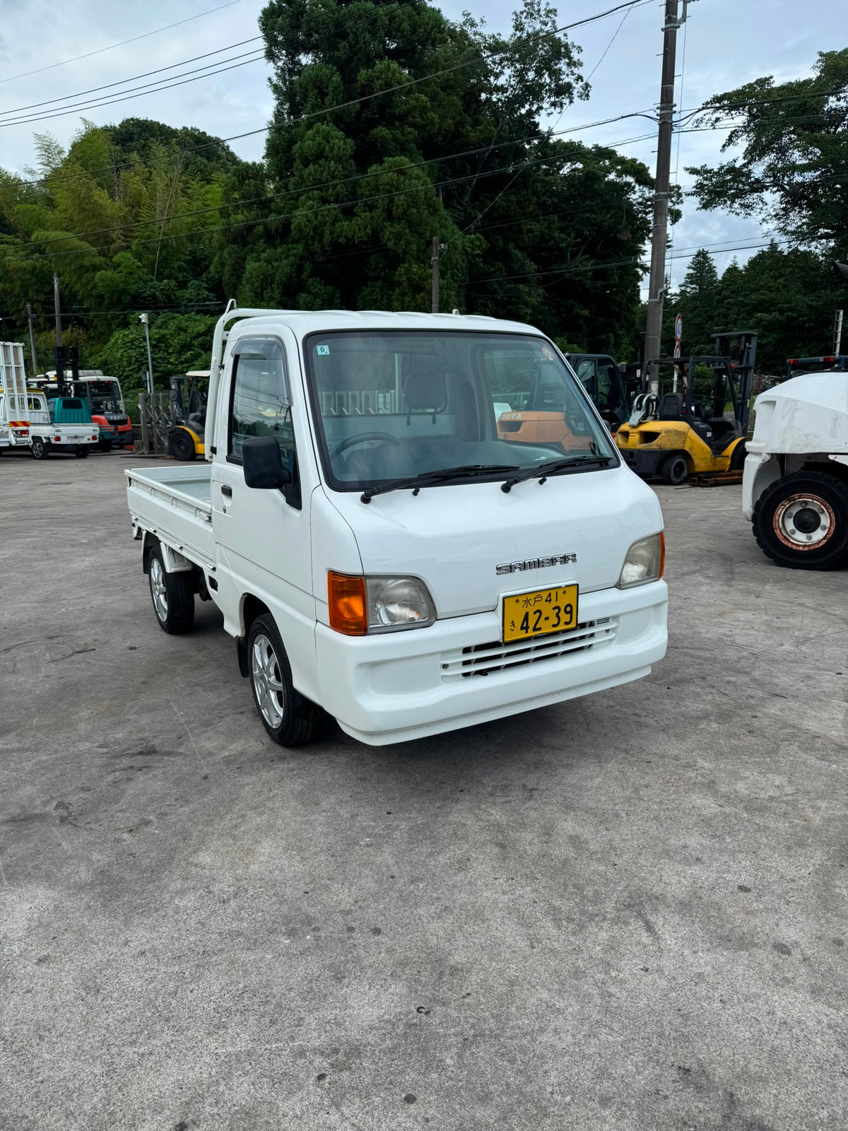 White 2001 Subaru Sambar 4x4 kei truck