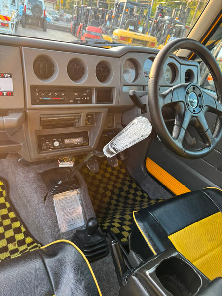 Yellow and black 1997 Suzuki Jimny Sierra 4x4 kei SUV, photo 9 of 11