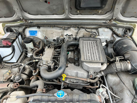 Green 1997 Suzuki Jimny 4x4 kei SUV, photo 13 of 14